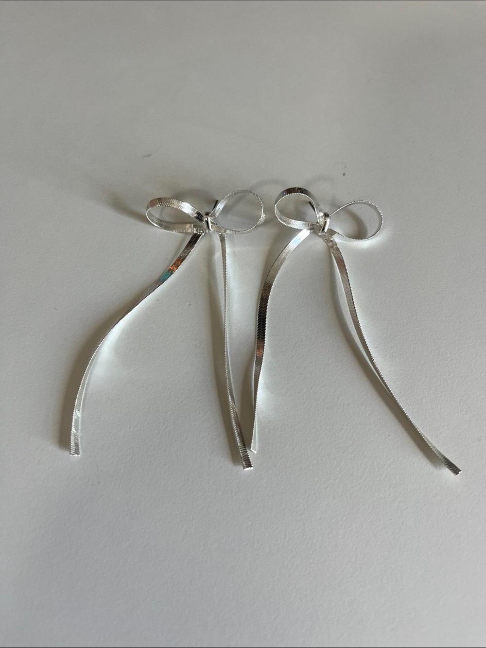 Silver Bow Ribbon Drop Earrings